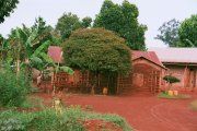 House built of red clay near Jinja, Uganda